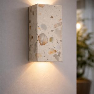 Decorative wall-mounted sconce